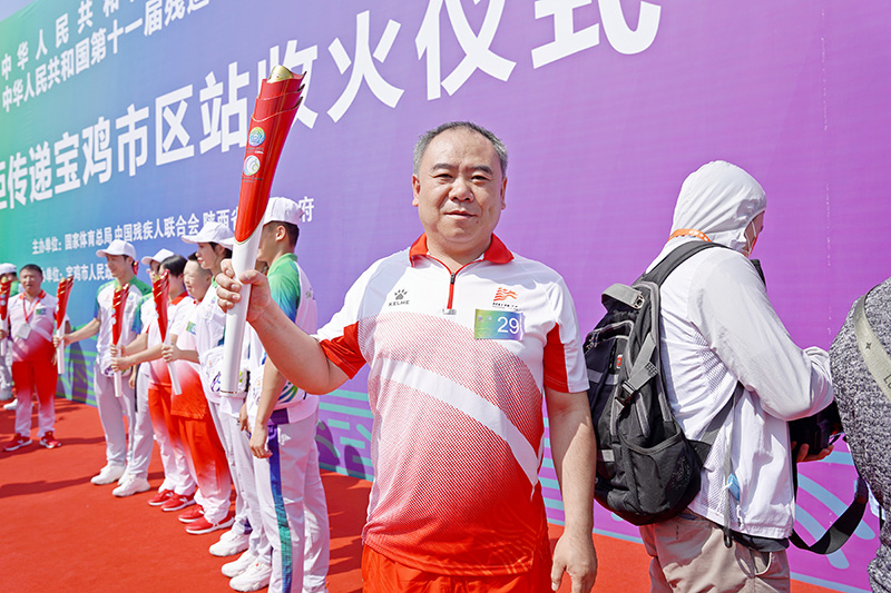 十四運火炬手（shǒu）楊忠州1.jpg